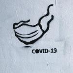 drawing of a face mask and the word "covid-19"