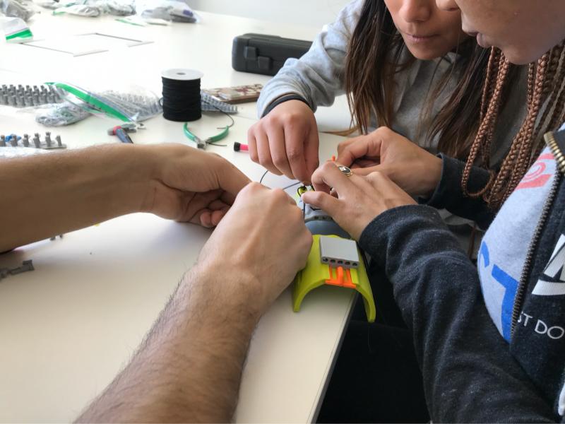 students building a 3d printed prosthetic device